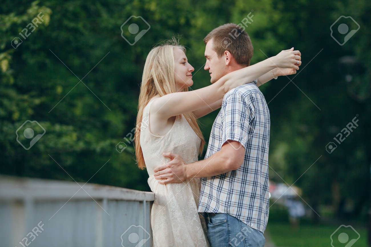 loving couple walking park kissing hd stock photo picture and