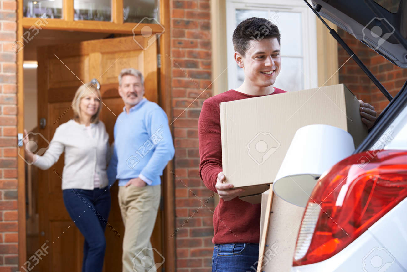 Adult Son Moving Out Of Parent's Home - 54904766 Adult Son Moving Out Of Parent's Home - 54904766