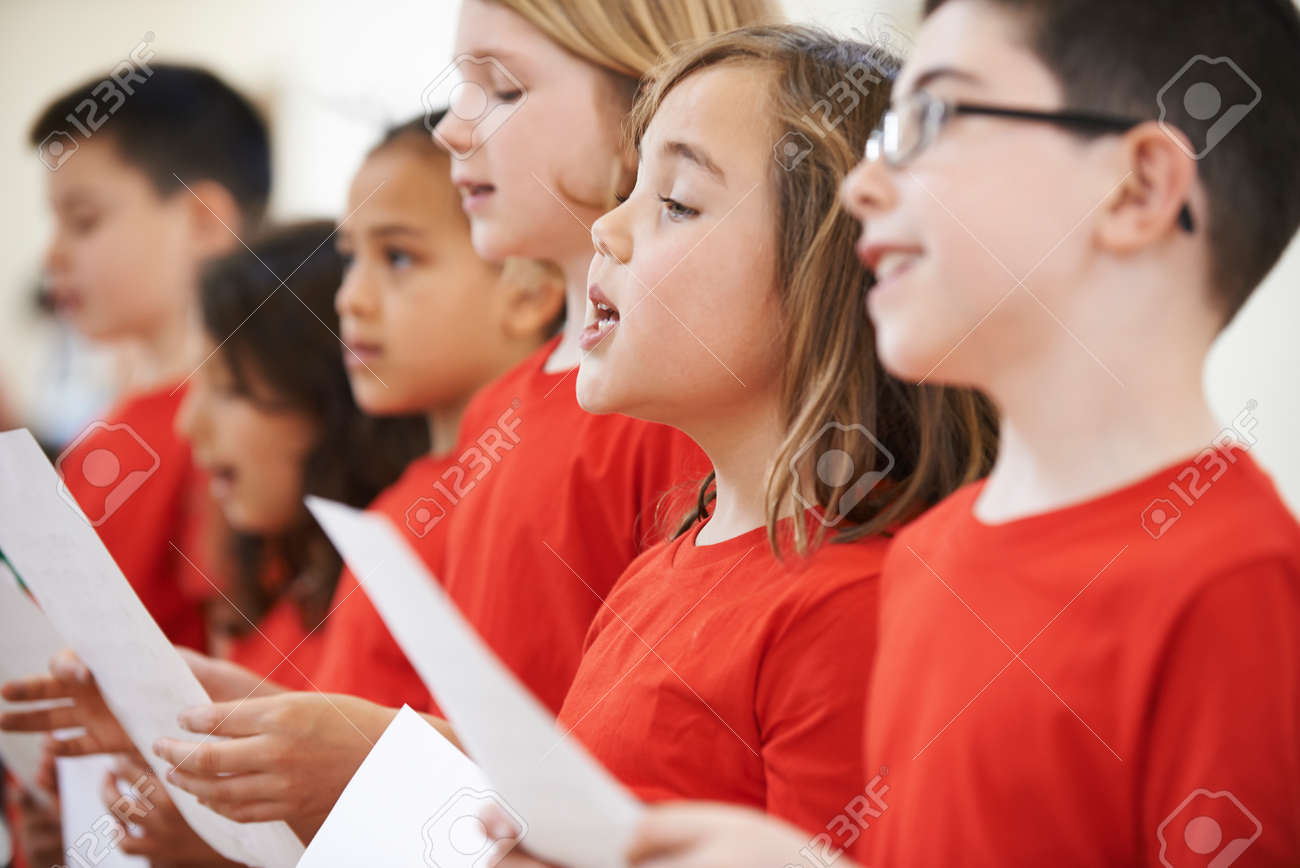 Group Of School Children Singing In Choir Together - 64626267 Group Of School Children Singing In Choir Together - 64626267