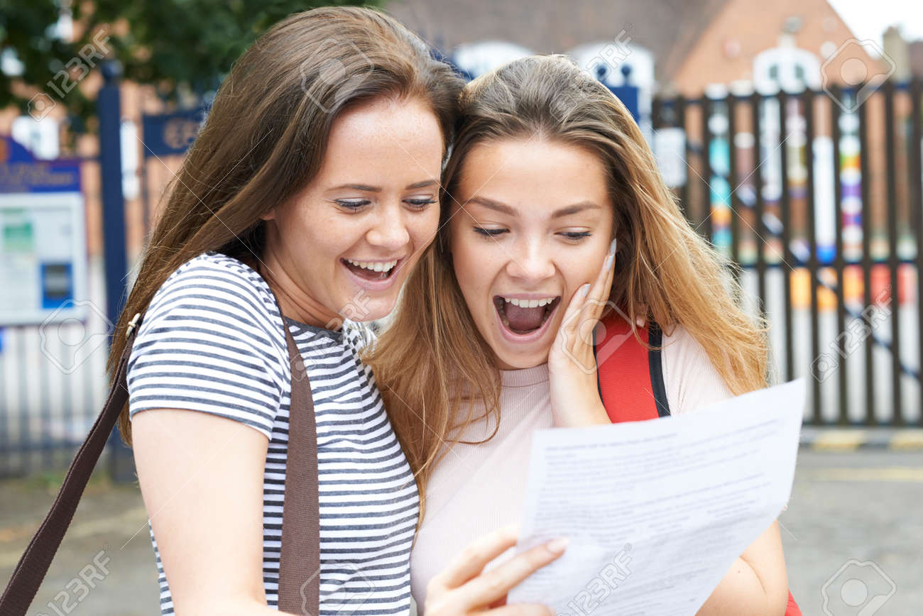 Teenage Girls Celebrating Exam Results - 63089823 Teenage Girls Celebrating Exam Results - 63089823