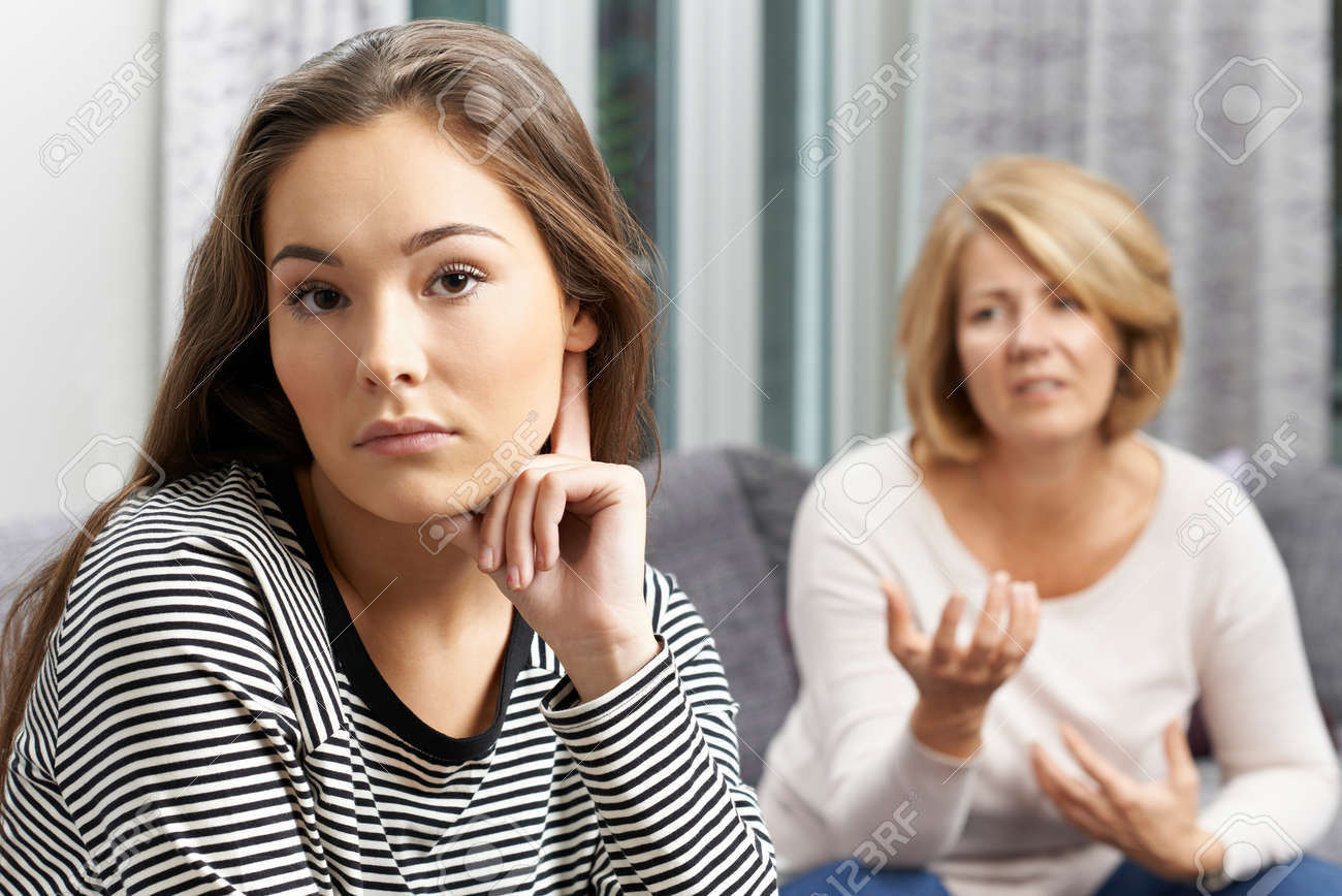 Bored Teenage Girl Being Told Off By Mother - 66305460 Bored Teenage Girl Being Told Off By Mother - 66305460