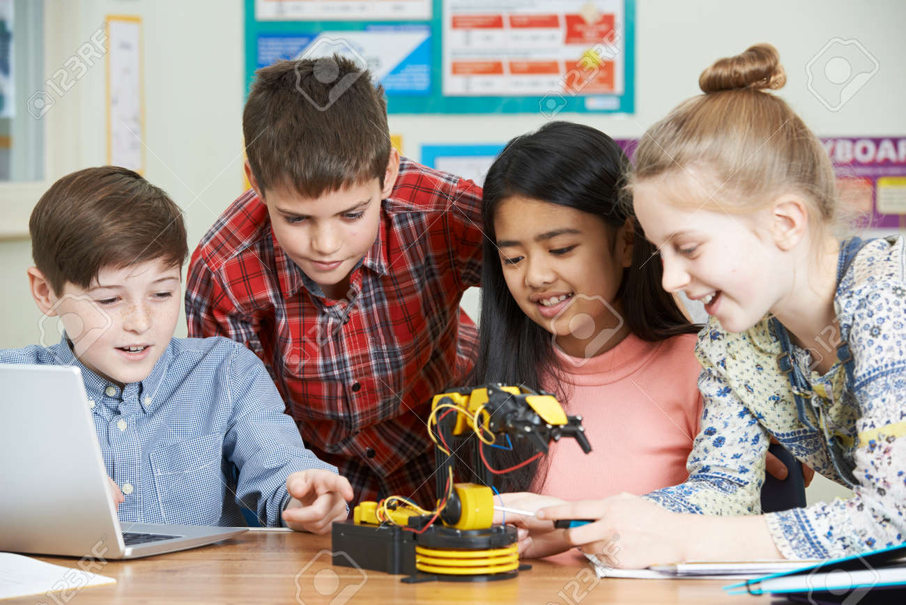 Pupils In Science Lesson Studying Robotics - 69158556 Pupils In Science Lesson Studying Robotics - 69158556