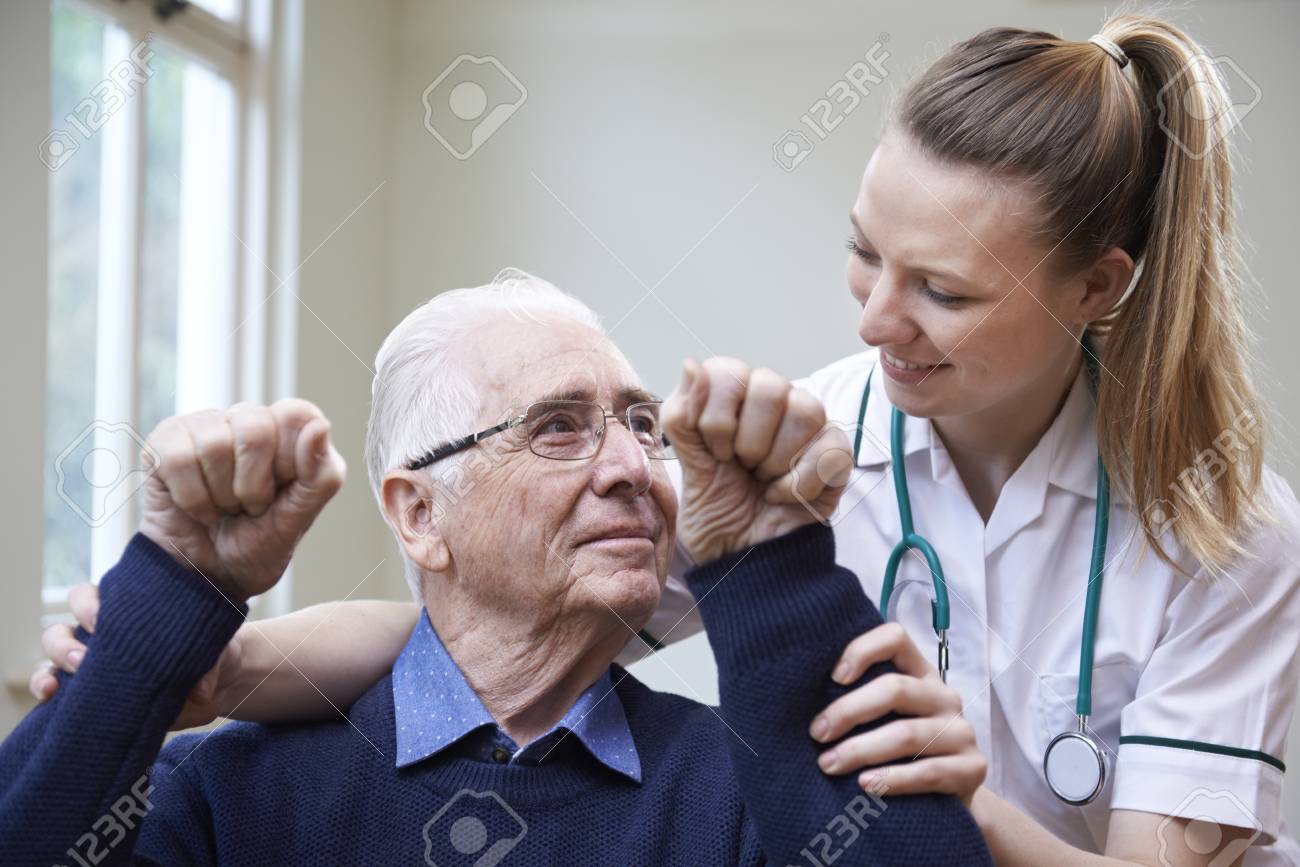 nurse assessing stroke victim by raising arms stock photo picture stroke nurse