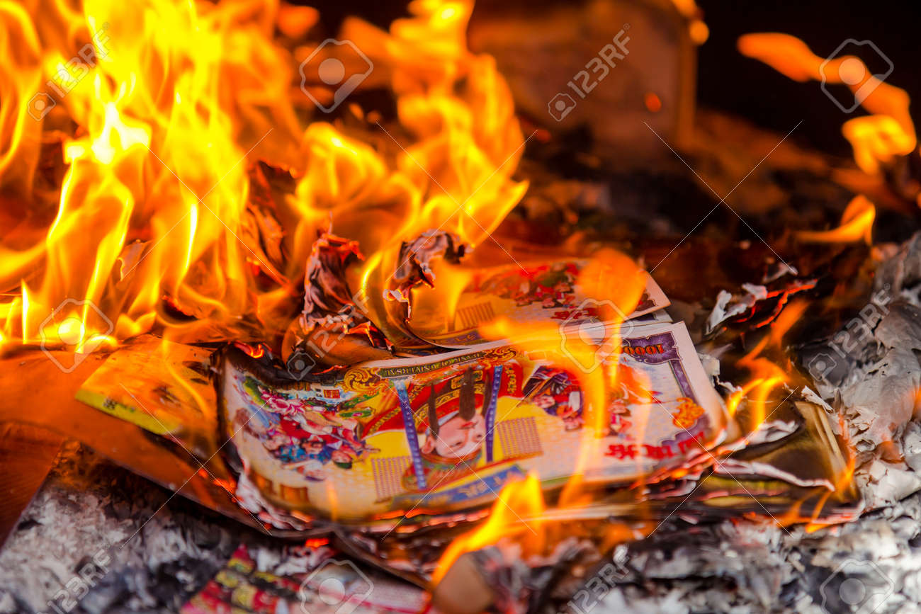 ghost money burning in