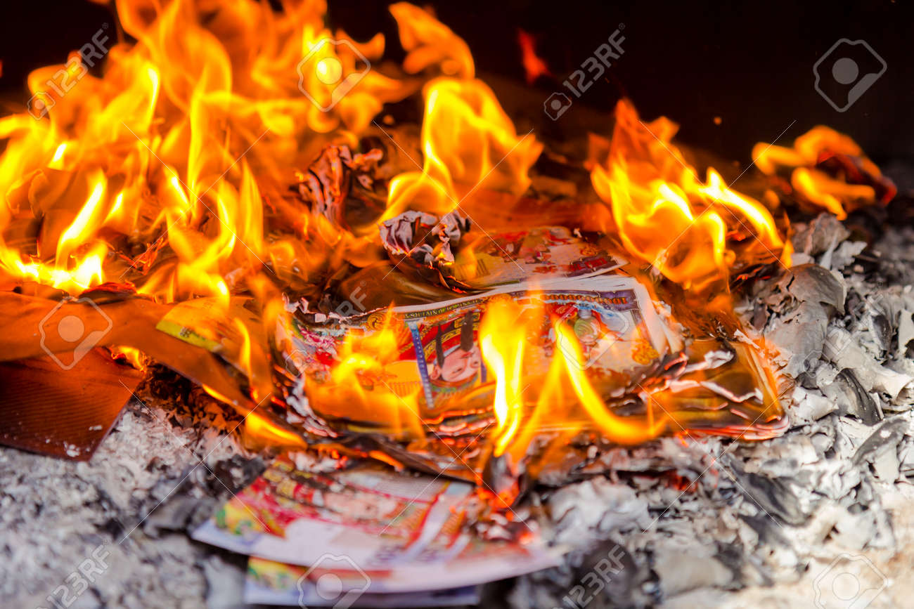 ghost money burning in