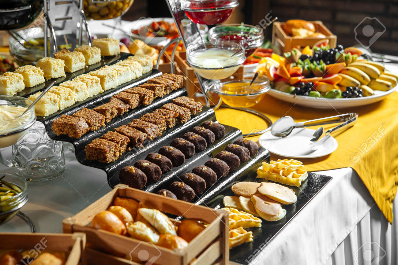 Restaurant lunch catering buffet with different sweets - 154280319 Restaurant lunch catering buffet with different sweets - 154280319
