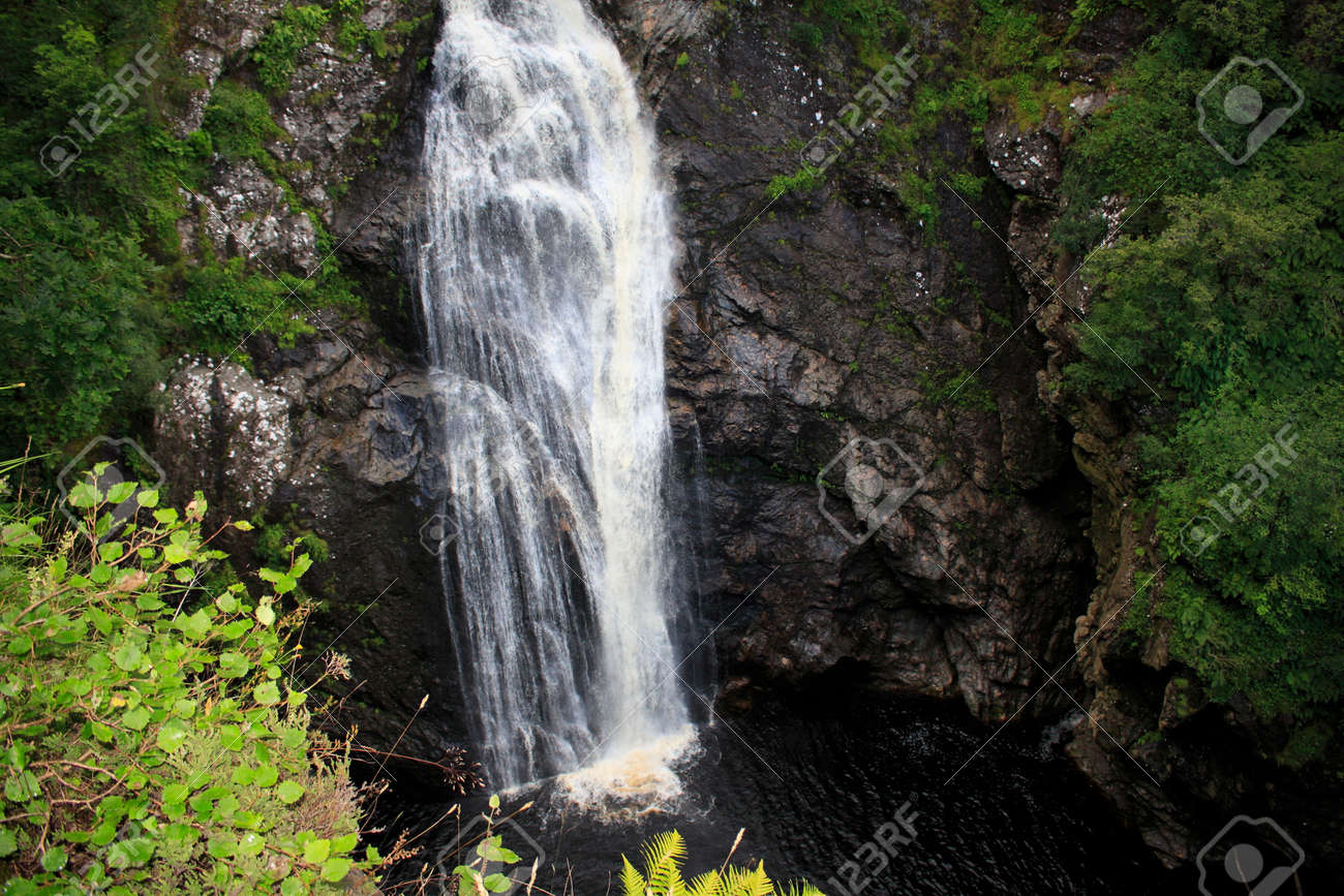 Waterfall Fall Of Foyers In The Woods With The Loch Ness In
