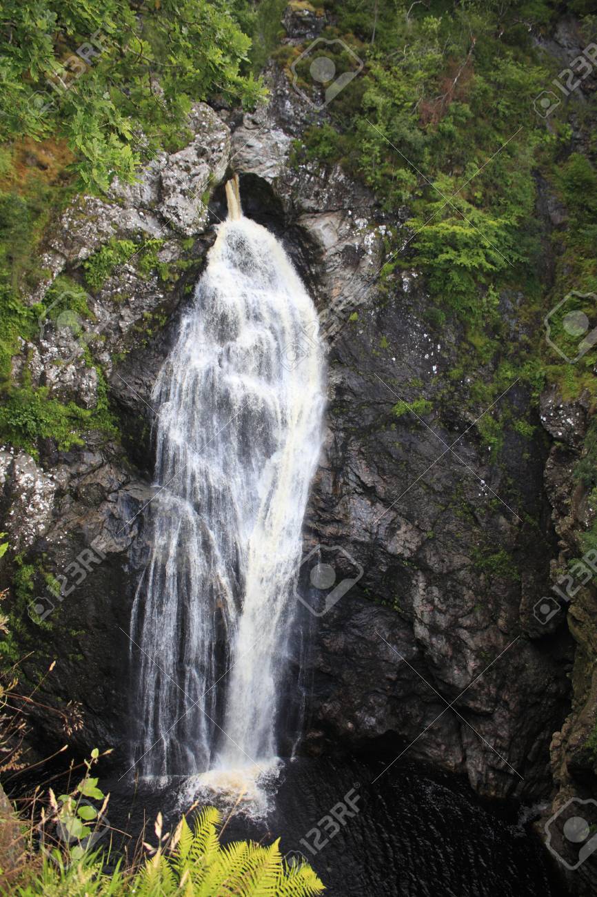 Waterfall Fall Of Foyers In The Woods With The Loch Ness In