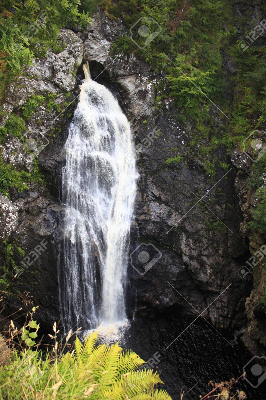 Waterfall Fall Of Foyers In The Woods With The Loch Ness In
