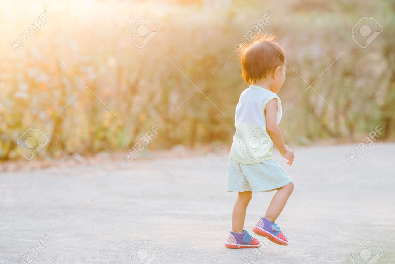when does a baby walk on their own