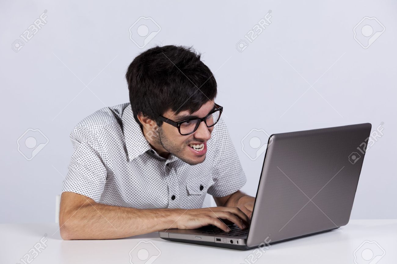 Nerd Teenager Working With His Laptop With A Funny Face Stock Photo, Picture And Royalty Free Image. Image 8174765. Nerd Teenager Working With His Laptop With A Funny Face Stock Photo, Picture And Royalty Free Image. Image 8174765.