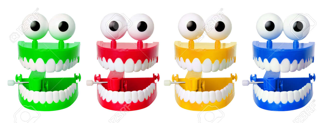 白い背景の上のチャタリングの歯おもちゃ の写真素材 画像素材 Image