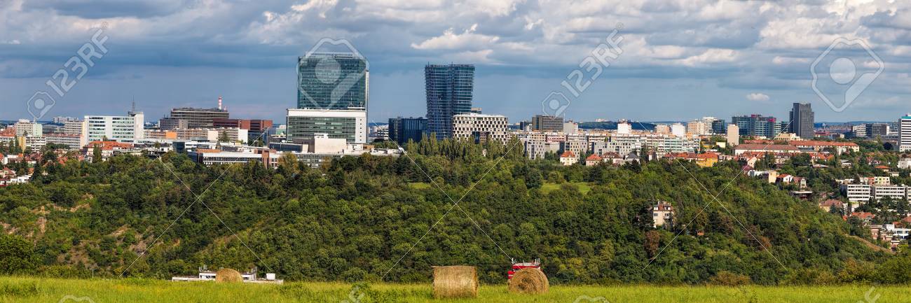 Wide panorama of Pankrac, Prague main business district with modern tall buildings, highest in Prague. Czech Republic, Europe. River Vltava is down in the valley. - 104890759 Wide panorama of Pankrac, Prague main business district with modern tall buildings, highest in Prague. Czech Republic, Europe. River Vltava is down in the valley. - 104890759