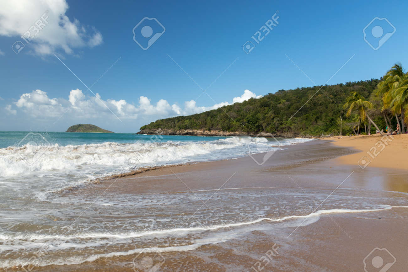 Orange Sand And Crushing Wave At