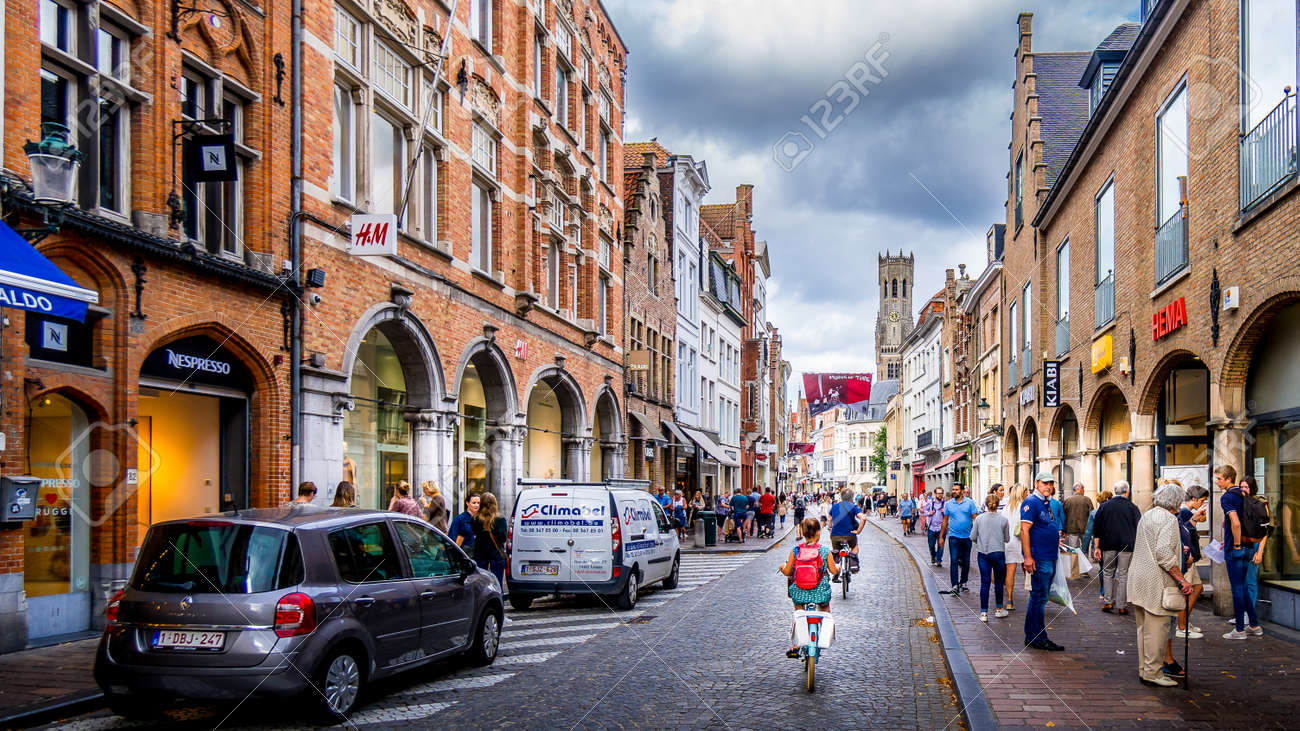 Bruges/Belgium-Sept 19, 2018: Early Morning activity on the normally busy Steenstraat in the historic city of Brugge in Belgium - 157481018 Bruges/Belgium-Sept 19, 2018: Early Morning activity on the normally busy Steenstraat in the historic city of Brugge in Belgium - 157481018