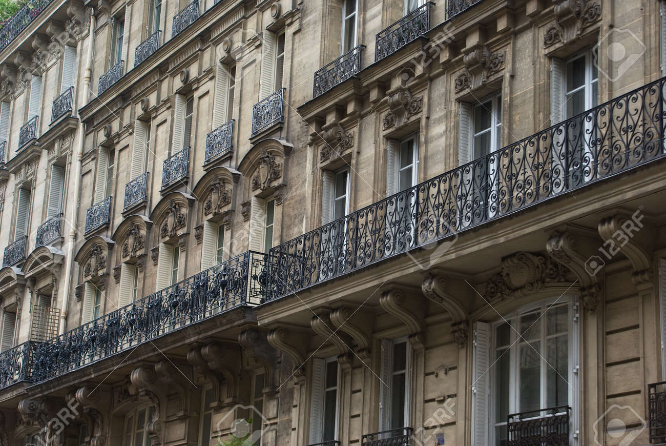 Facade of classic apartment buildings in Paris - 4382613 Facade of classic apartment buildings in Paris - 4382613