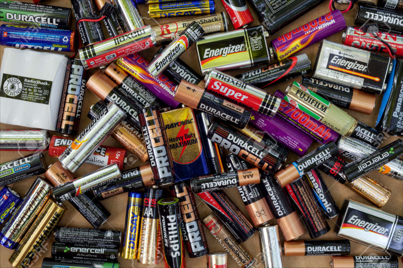 FAIRFAX, VA - JULY 16: Different types of used batteries ready for recycling lying in a heap at a recycling center on July 16, 2013 in Fairfax, VA. Types are AAA, AA, 9-volt and cordless phones. - 24978669 FAIRFAX, VA - JULY 16: Different types of used batteries ready for recycling lying in a heap at a recycling center on July 16, 2013 in Fairfax, VA. Types are AAA, AA, 9-volt and cordless phones. - 24978669