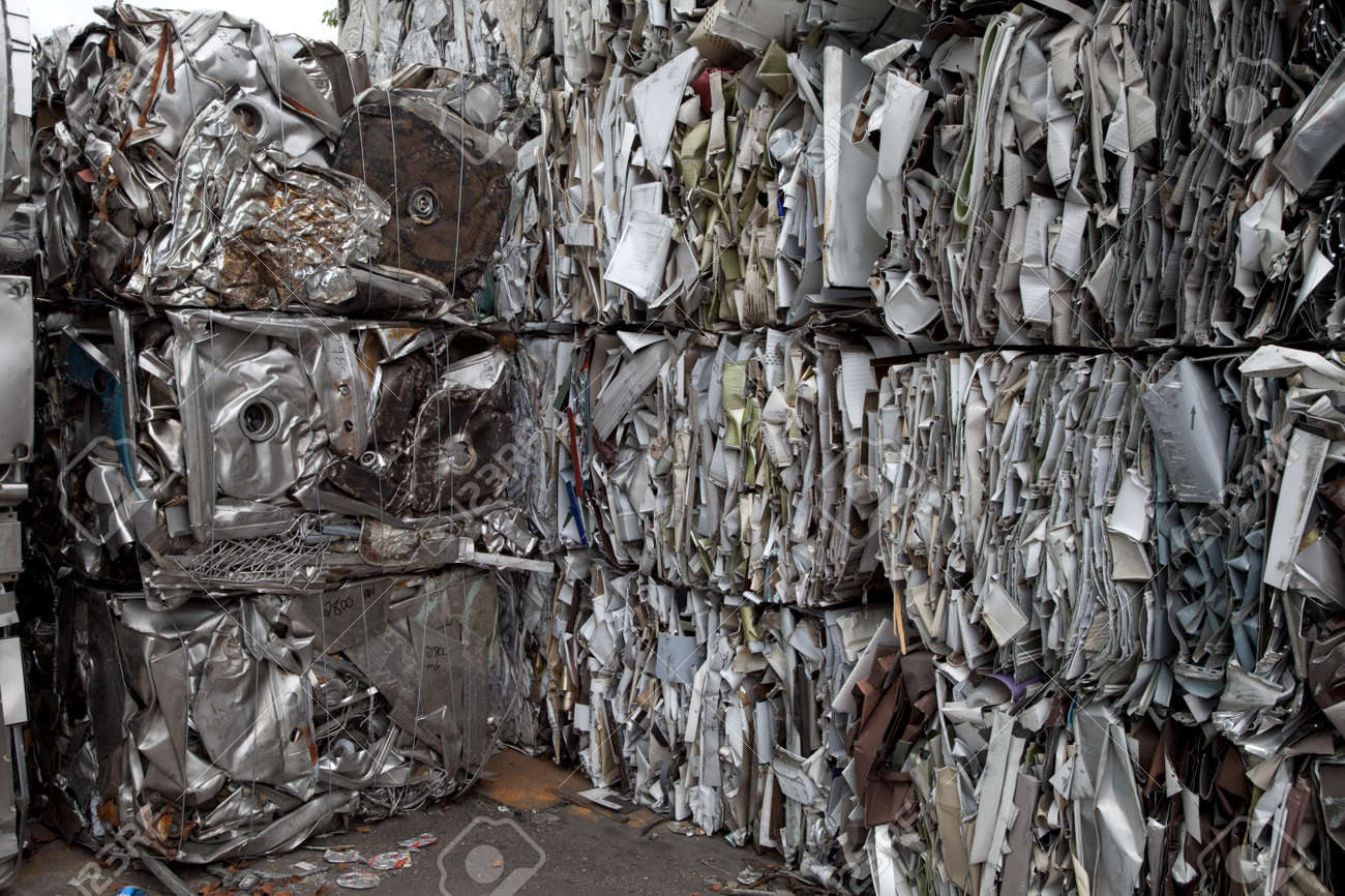 Piles of scrap metal bundled in cubes for recycling - 24982252 Piles of scrap metal bundled in cubes for recycling - 24982252