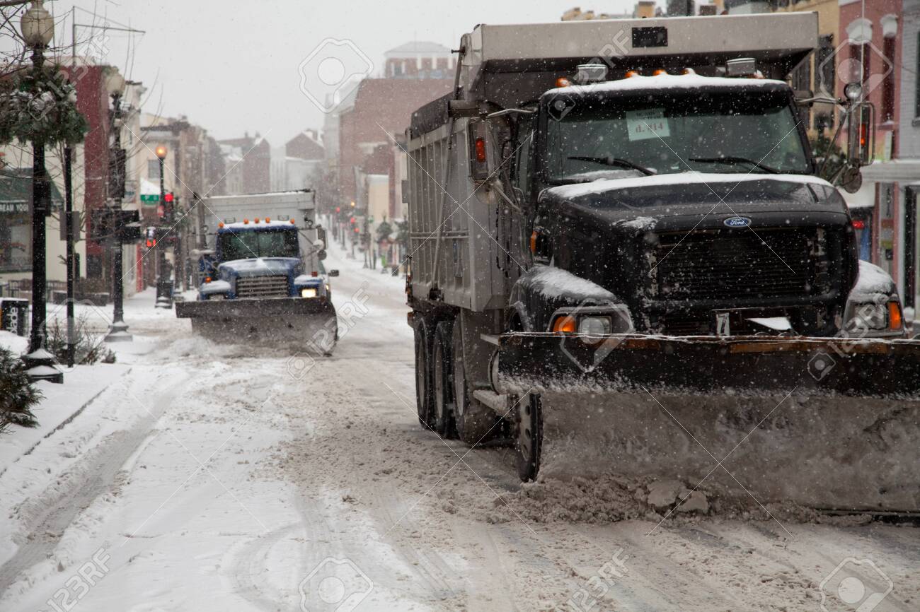 Trucks plowing Washington DC streets from the Winter storm on February 3, 2014 - 26761174 Trucks plowing Washington DC streets from the Winter storm on February 3, 2014 - 26761174