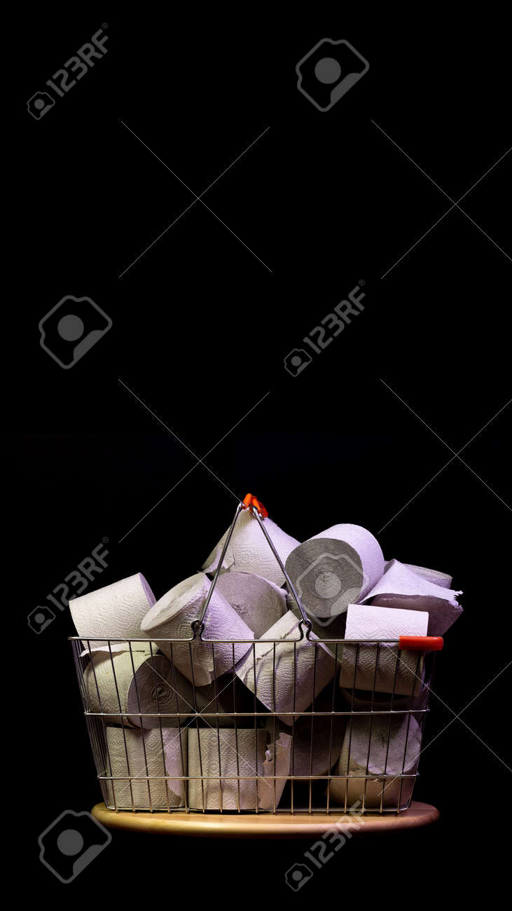 Shopping basket with rolls of toilet paper isolated on black - 144390487 Shopping basket with rolls of toilet paper isolated on black - 144390487