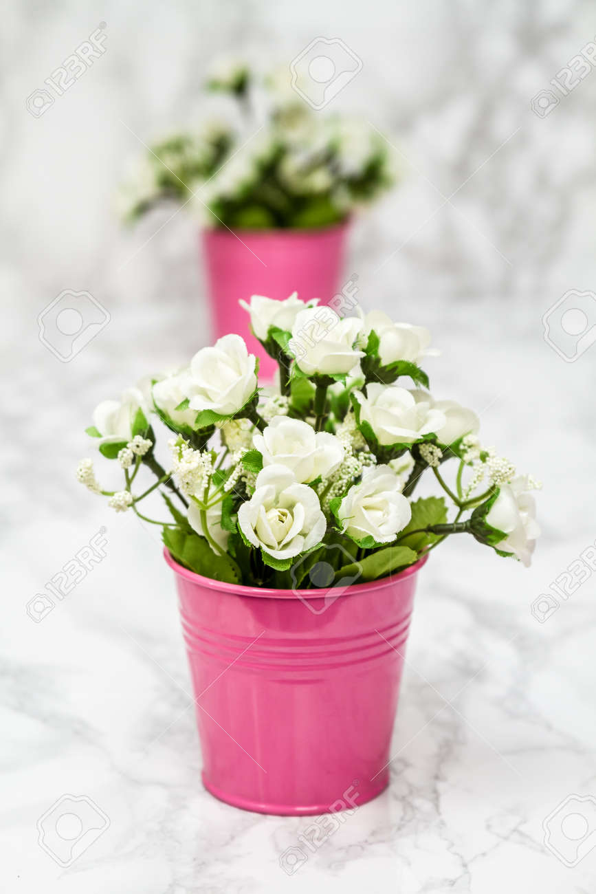 Small Decorative Artificial White Flowers In Pink Pot