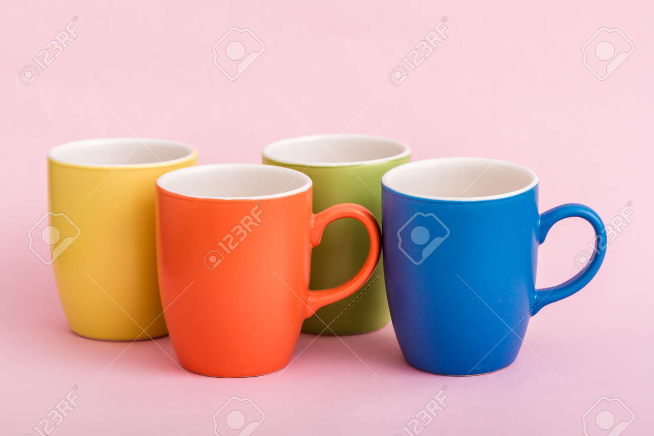 colorful coffee mugs on pink background stock photo picture and