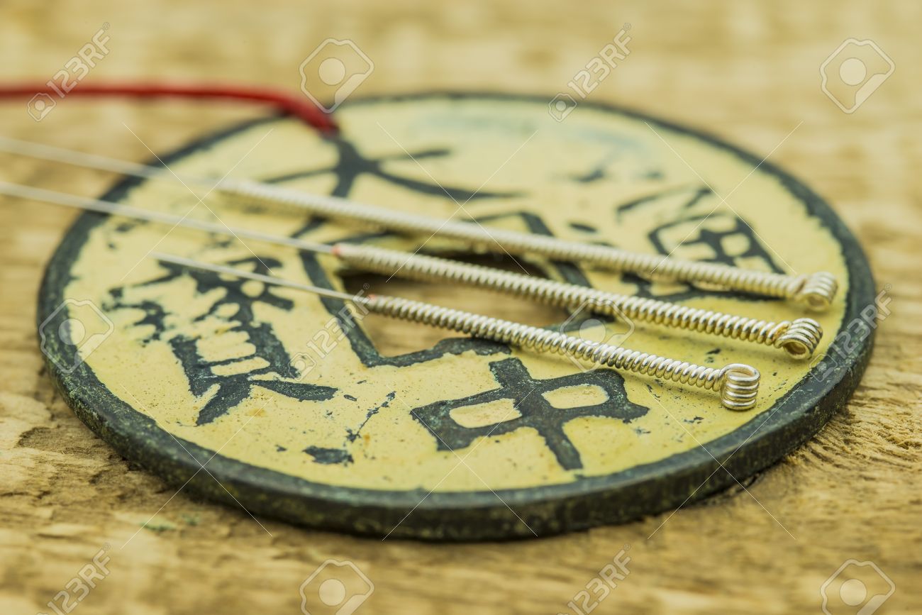 Acupuncture needles with antique chinese coin - 24972441 Acupuncture needles with antique chinese coin - 24972441