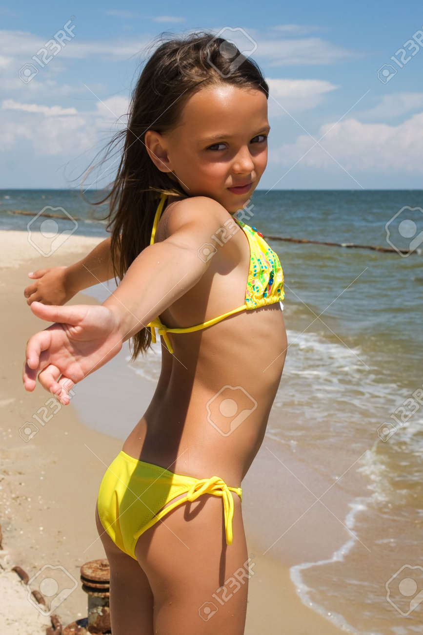 Young Girl On The Beach