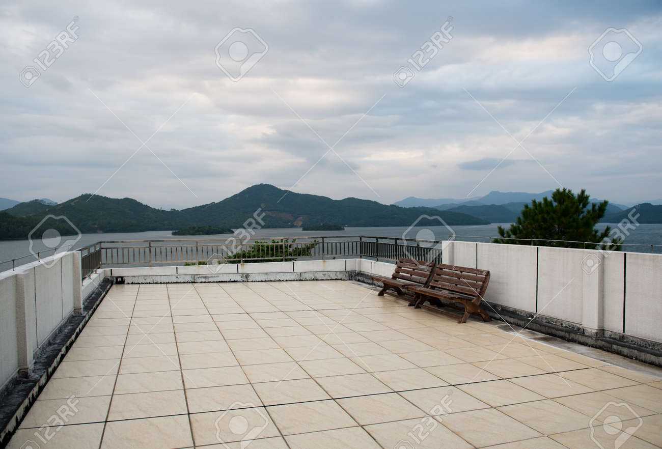 Apartment Building Roof apartment building roof top terrace exterior with bench. stock Apartment Building Roof apartment building roof top terrace exterior with bench. stock