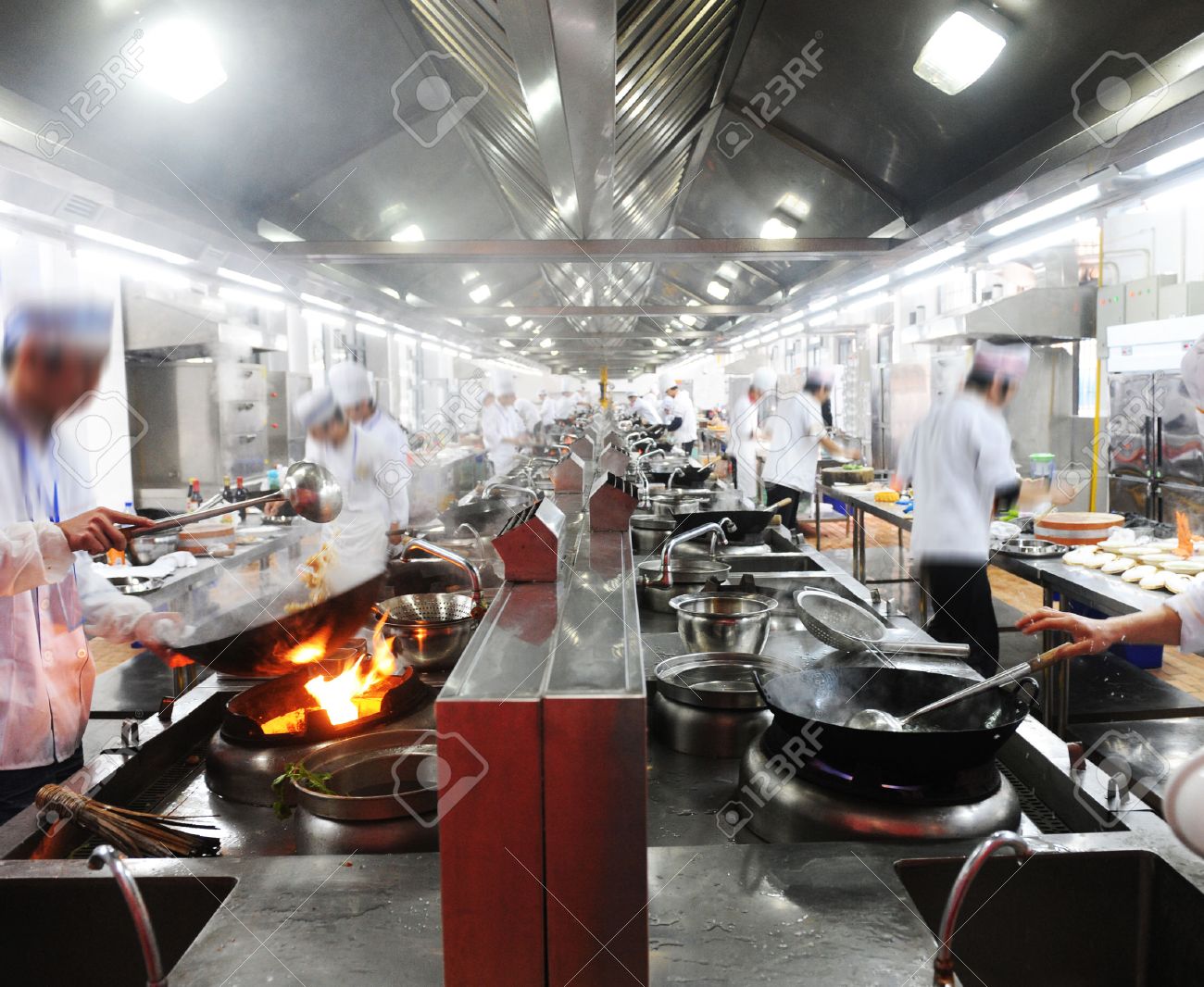 Restaurant Kitchen Chefs motion chefs in a chinese restaurant kitchen. stock photo, picture Restaurant Kitchen Chefs motion chefs in a chinese restaurant kitchen. stock photo, picture
