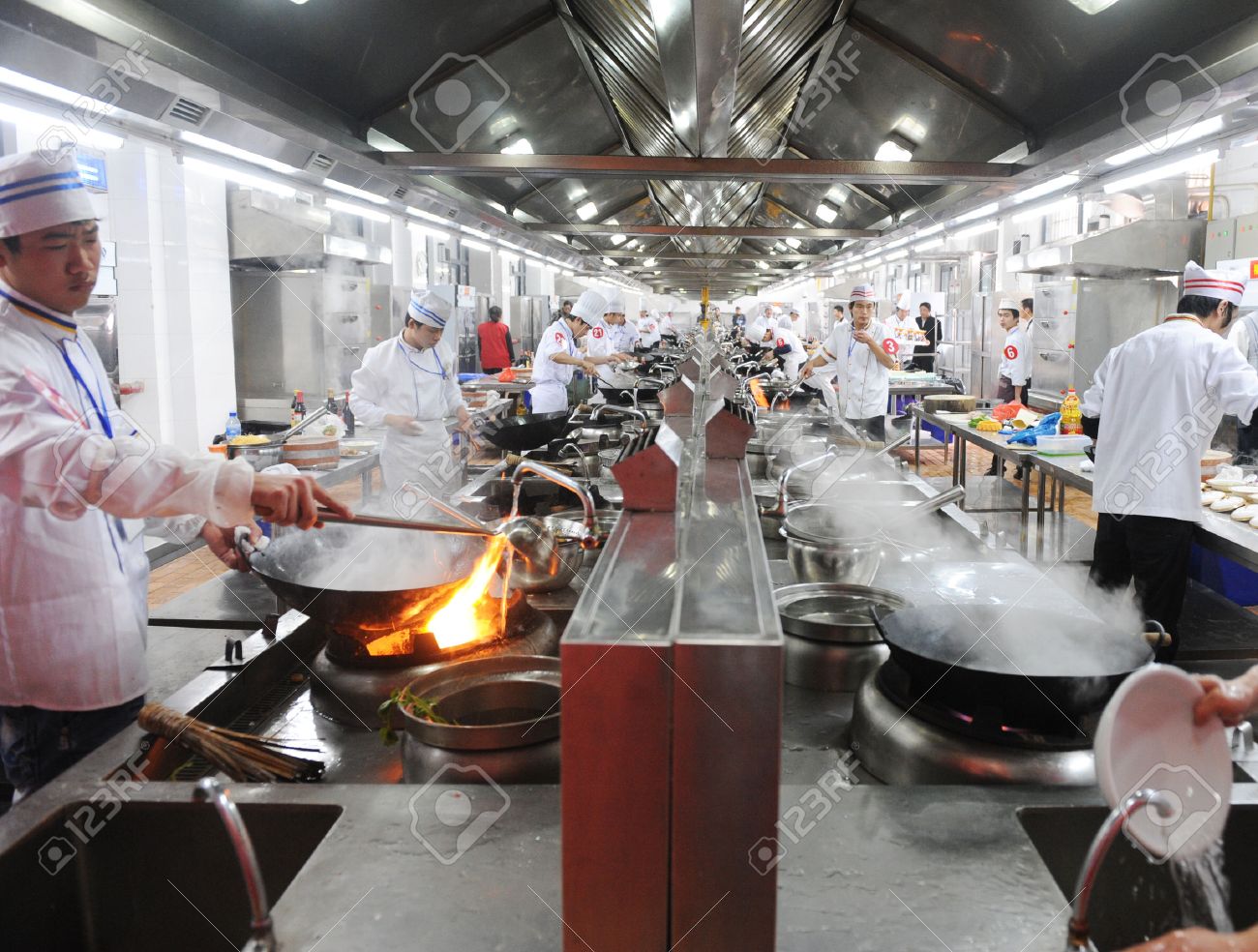 Fujian April 14 2010 Group Of Chefs Working Together In A