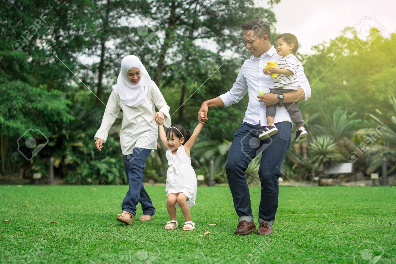 Malay Family Having Quality Time In A Park With Morning Mood Stock Photo Picture And Royalty Free Image Image 108425221