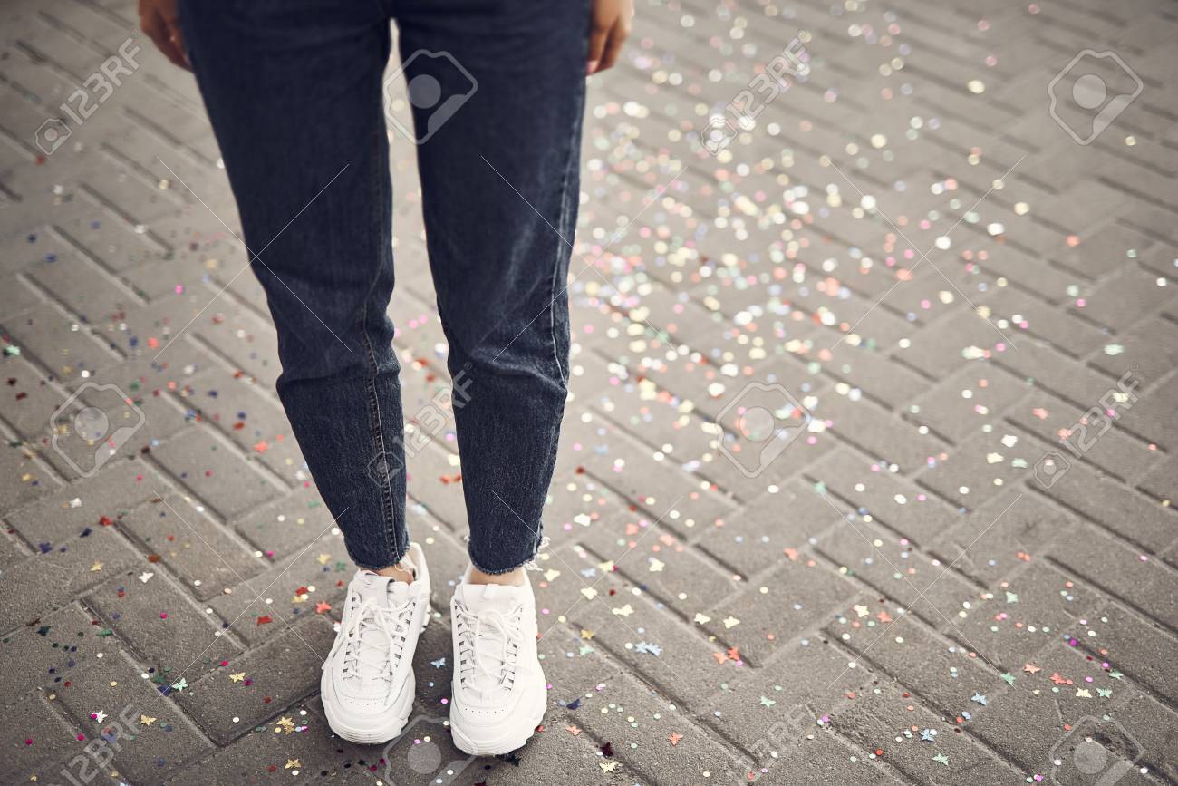 white trainers and jeans