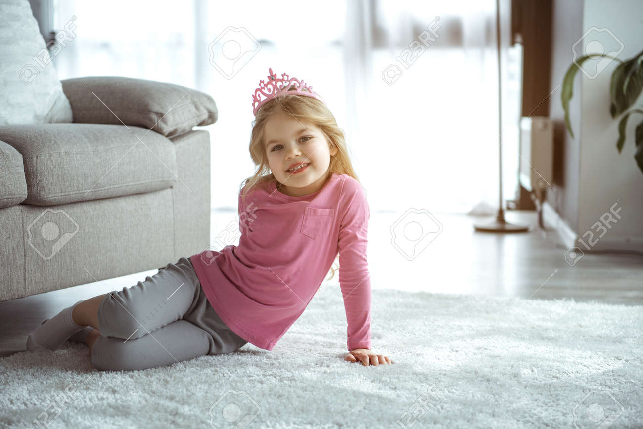 I am future queen full length portrait of dreamful little girl is wearing pink toy