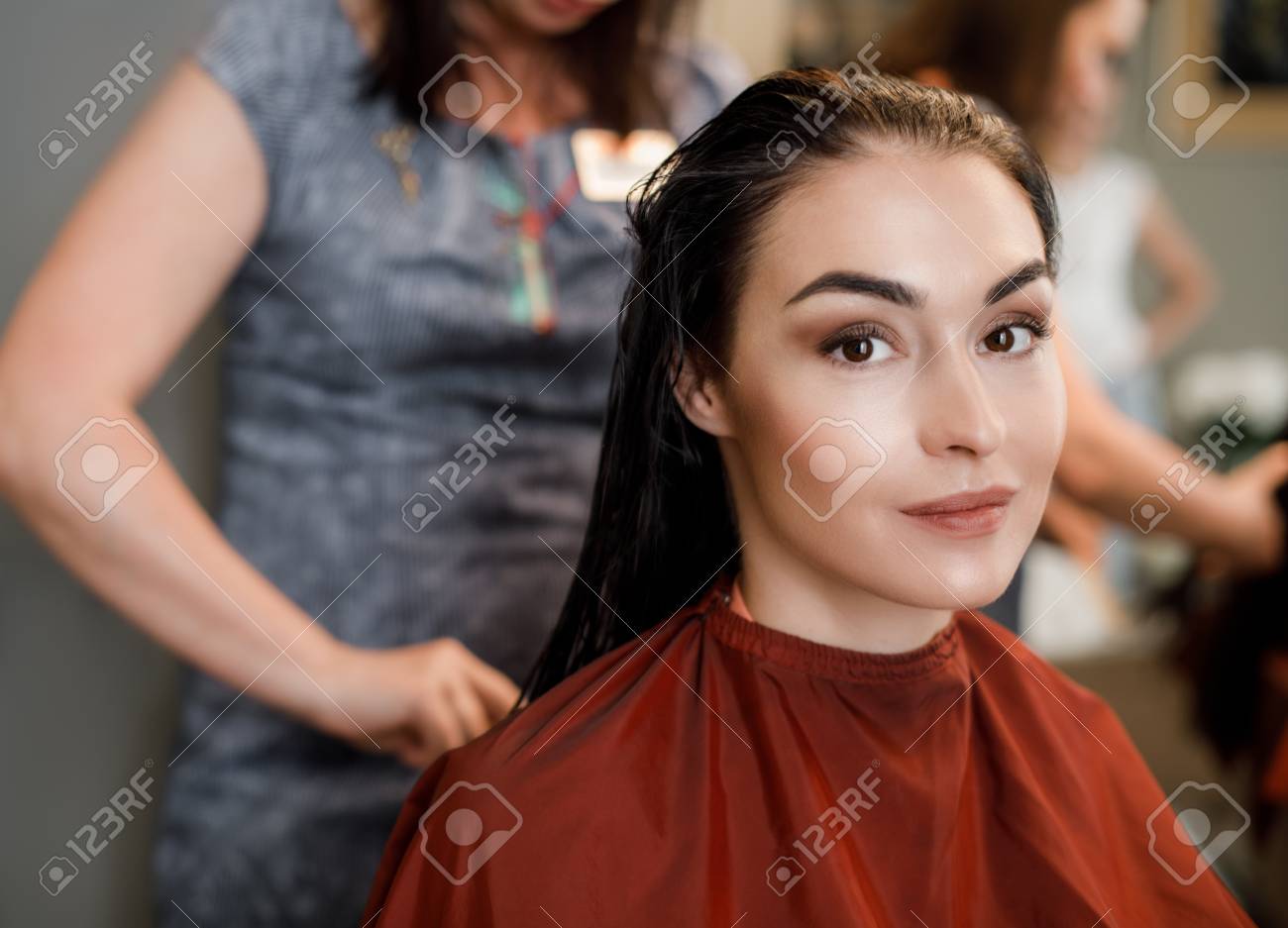 Hairstyle Master Gently Styling Long Hair Of Charming Cute Girl