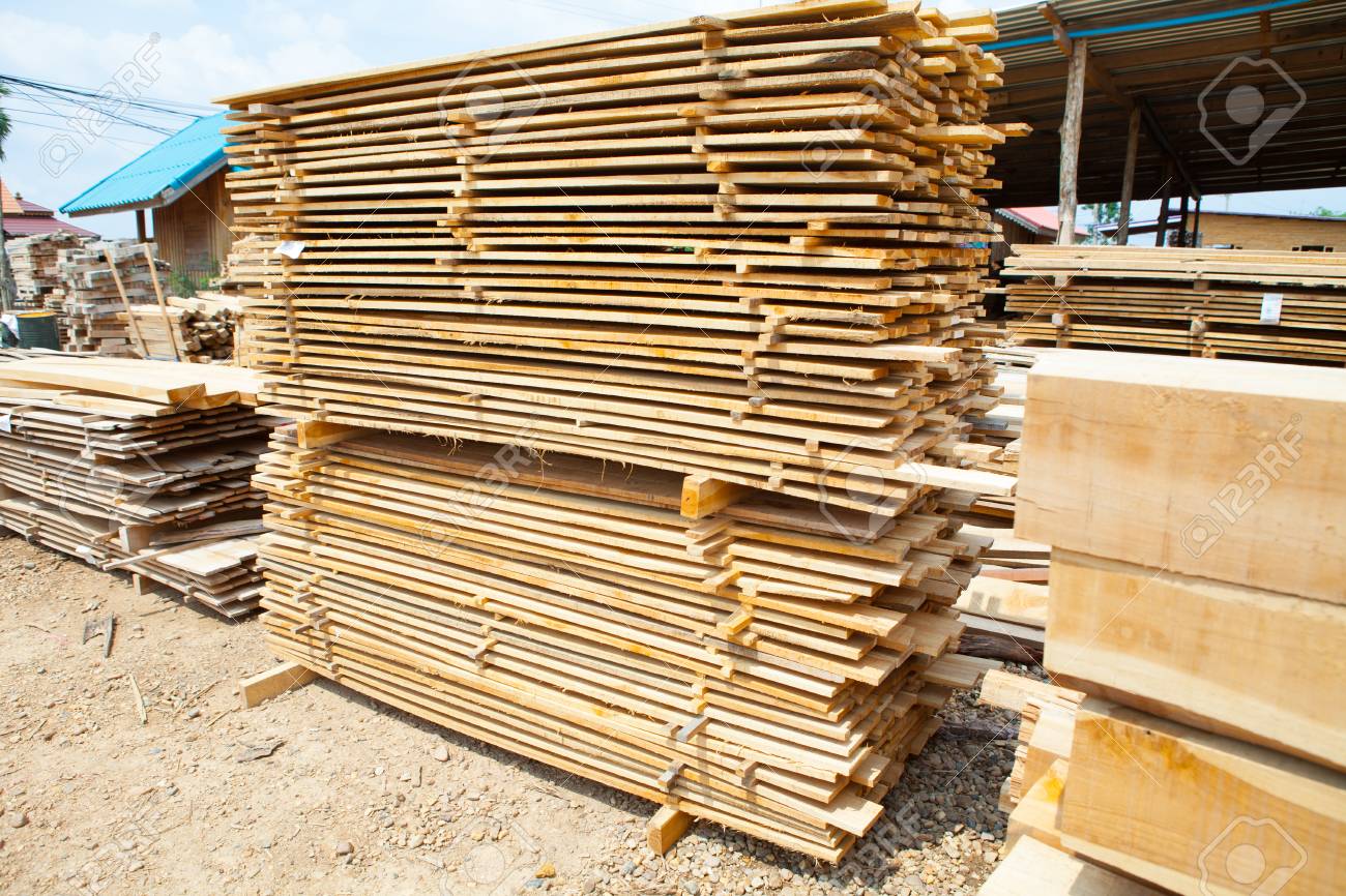 Stack Of Teak Wood Boards In Lumber Yard. Pile Wooden Stock Photo, Picture  And Royalty Free Image. Image 97579580.