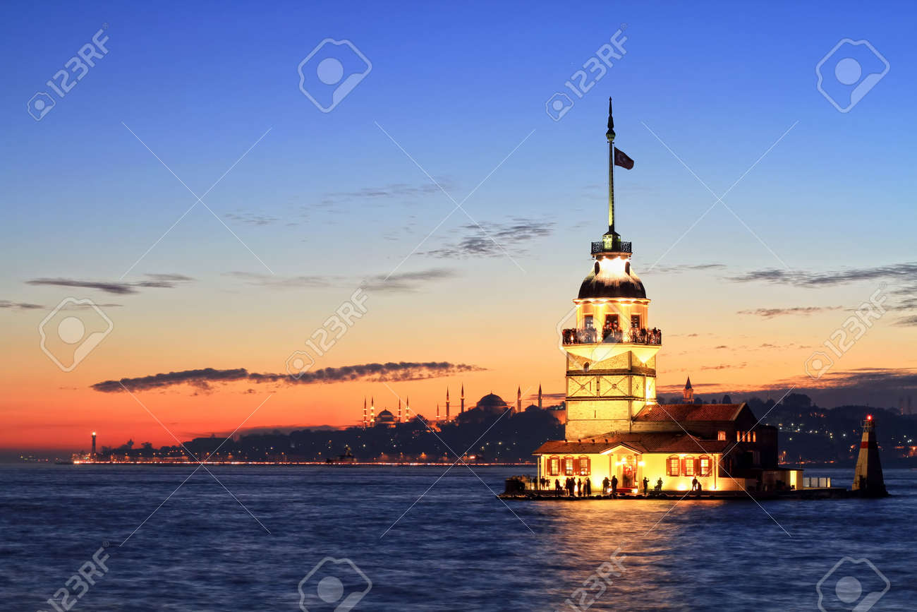 Istanbul Maiden Tower from the east in sunset. In the distance are such landmarks as Blue Mosque, Hagia Sophia and Topkapi Palace - 9531630 Istanbul Maiden Tower from the east in sunset. In the distance are such landmarks as Blue Mosque, Hagia Sophia and Topkapi Palace - 9531630