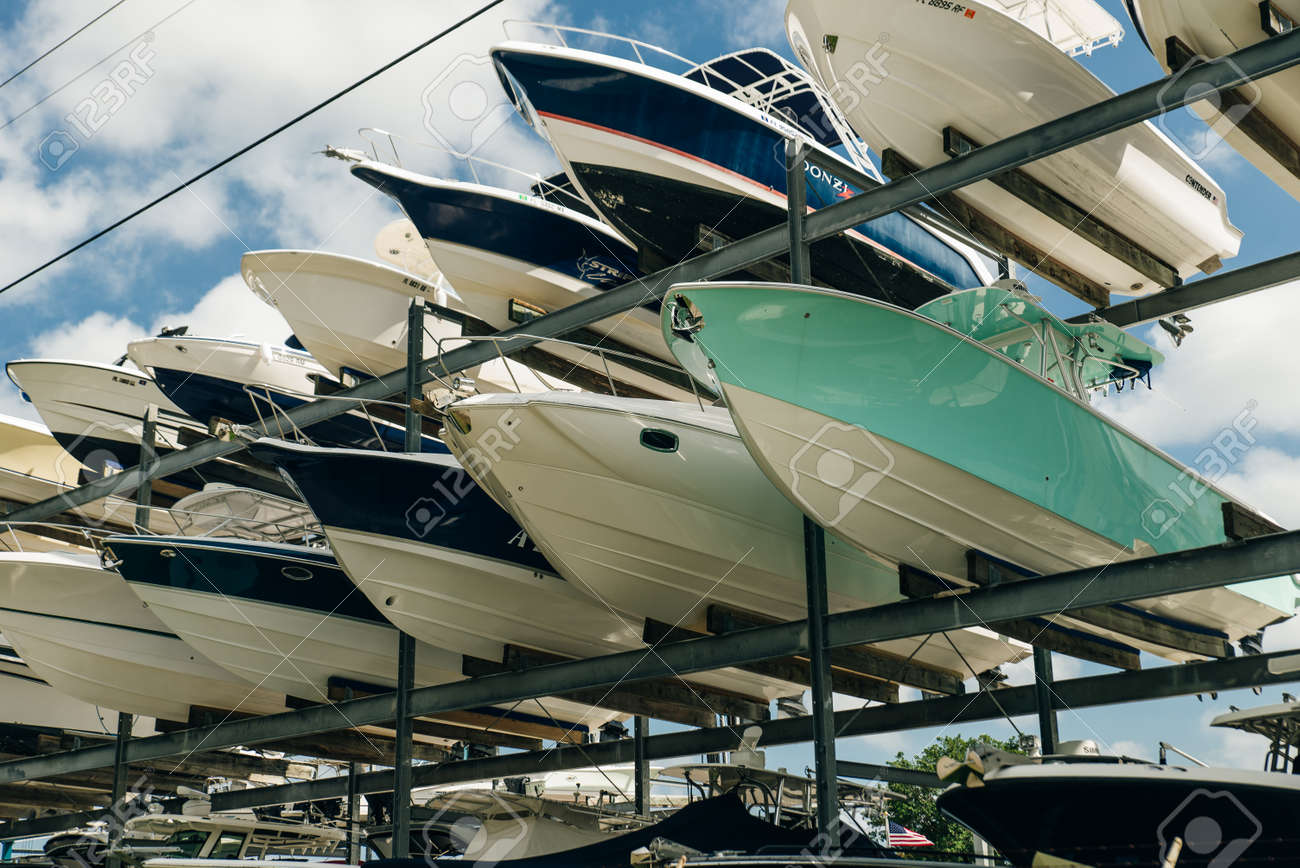 speed motor boats are stapled in a garage system in the prestigious harbor in Miami. - 150715674 speed motor boats are stapled in a garage system in the prestigious harbor in Miami. - 150715674