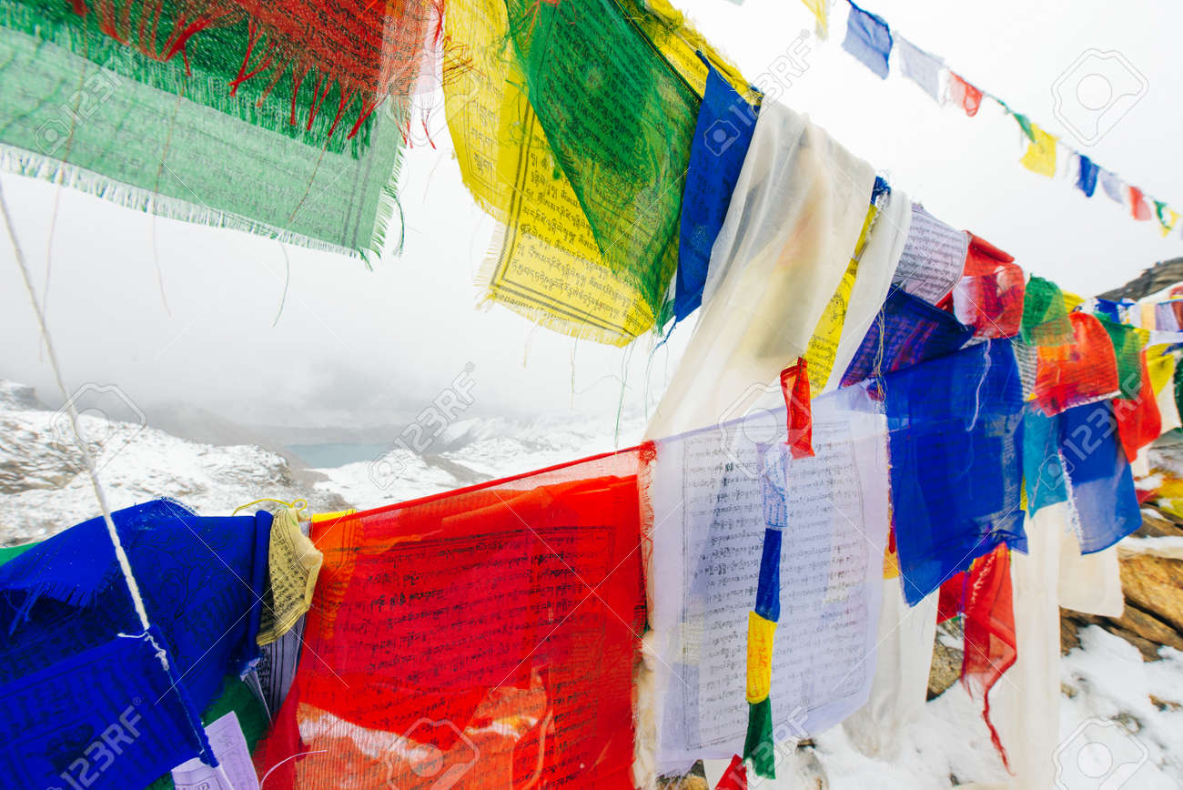 Colorful Buddhist prayer flags at blue sky in Kathmandu valley, Nepal. - 169727760 Colorful Buddhist prayer flags at blue sky in Kathmandu valley, Nepal. - 169727760