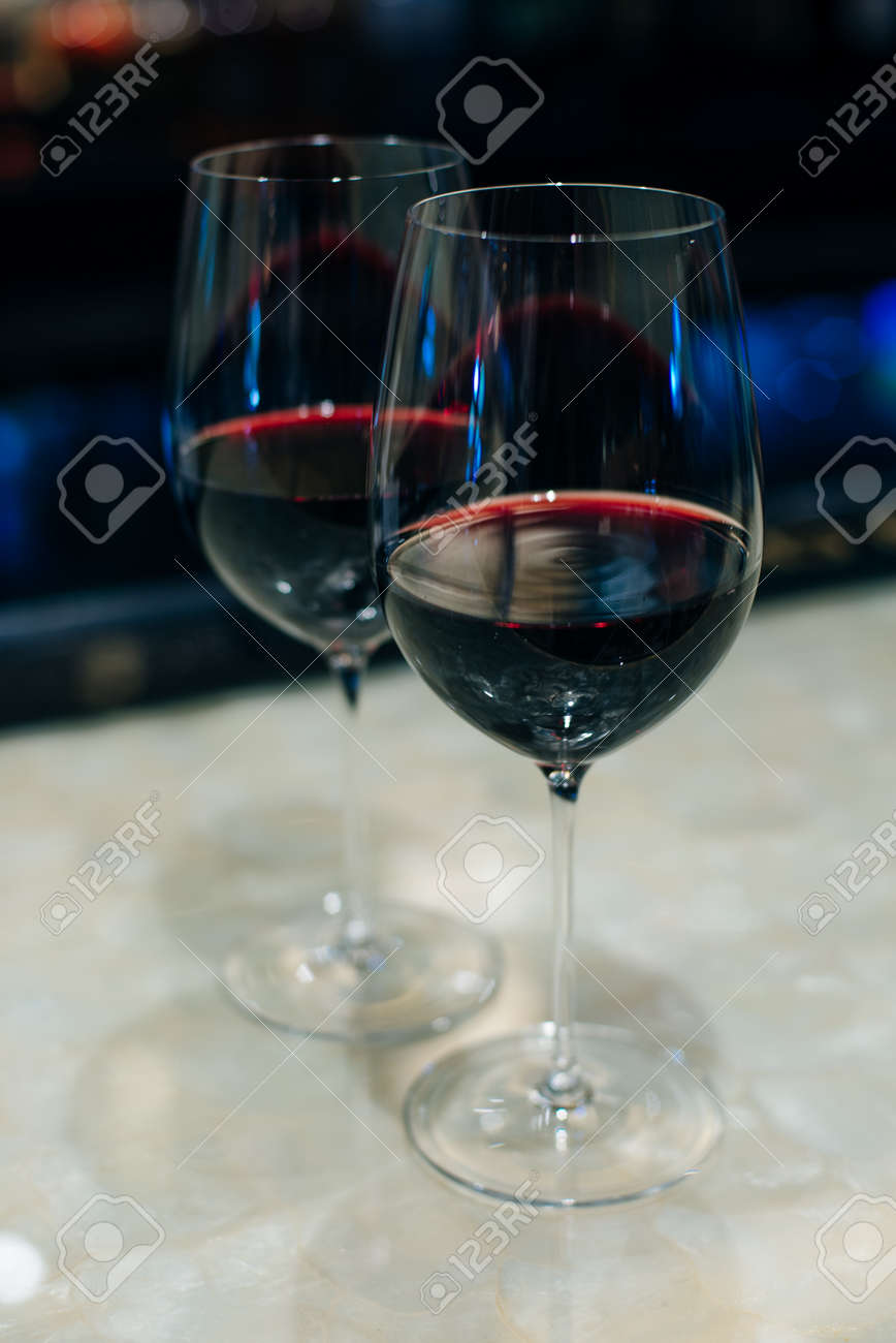 glasses with red wine on bar counter in restaurante. - 169532639 glasses with red wine on bar counter in restaurante. - 169532639