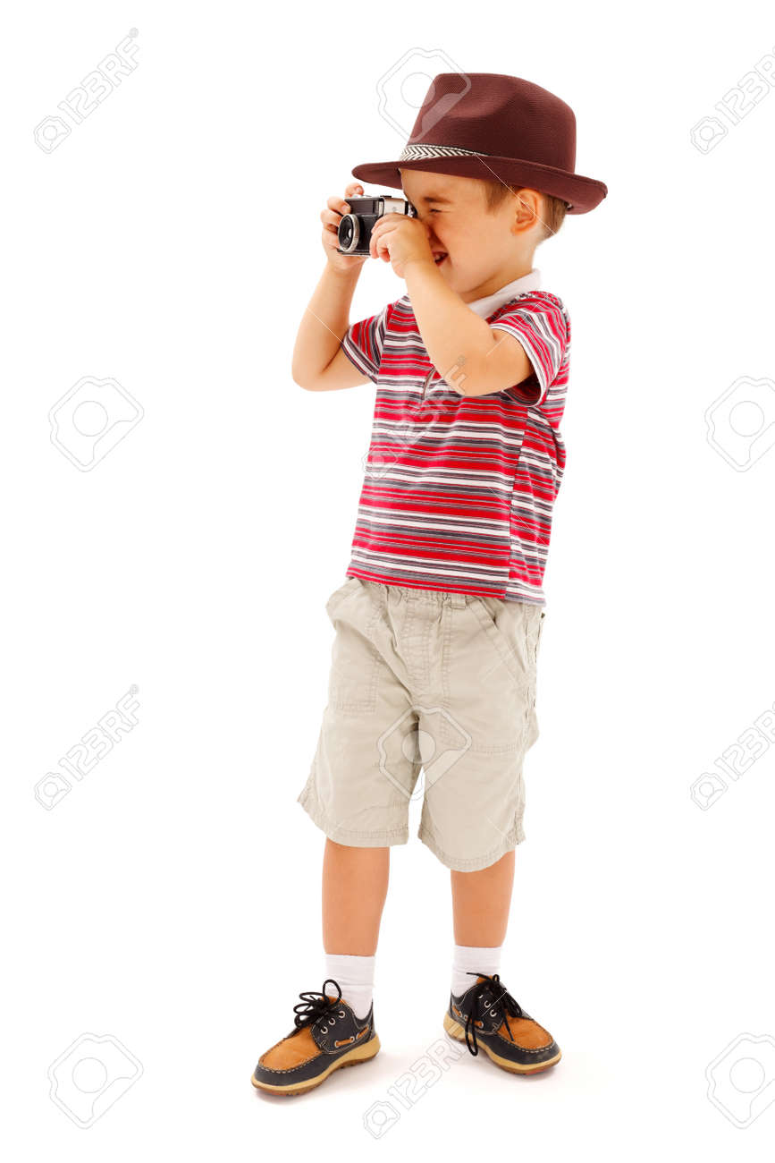 Little boy in hat, taking photos with an old fashioned camera - 22163032 Little boy in hat, taking photos with an old fashioned camera - 22163032