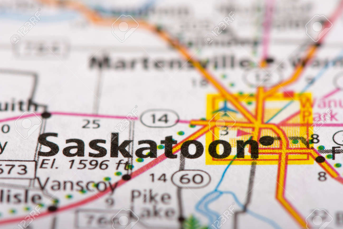 closeup of saskatoon saskatchewan on a road map of canada stock photo 77590721
