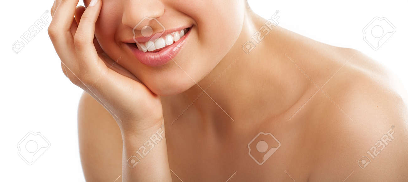 Beautiful young European woman with fresh smooth glowing tanned skin and healthy white teeth. - 38854289 Beautiful young European woman with fresh smooth glowing tanned skin and healthy white teeth. - 38854289
