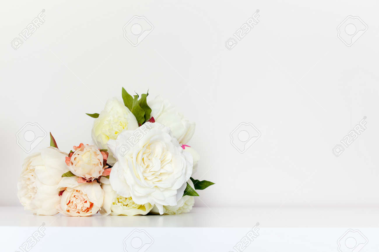 Beautiful peonies bouquet in minimalist indoor setting. - 56478013 Beautiful peonies bouquet in minimalist indoor setting. - 56478013