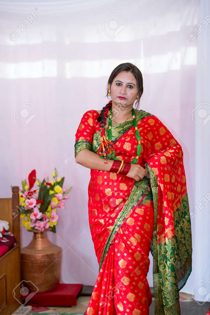 https://previews.123rf.com/images/idealnabraj/idealnabraj1809/idealnabraj180900214/108470174-beautiful-nepali-women-in-a-traditional-dress-up-with-wearing-saree-and-jewelleries-at-teej.jpg