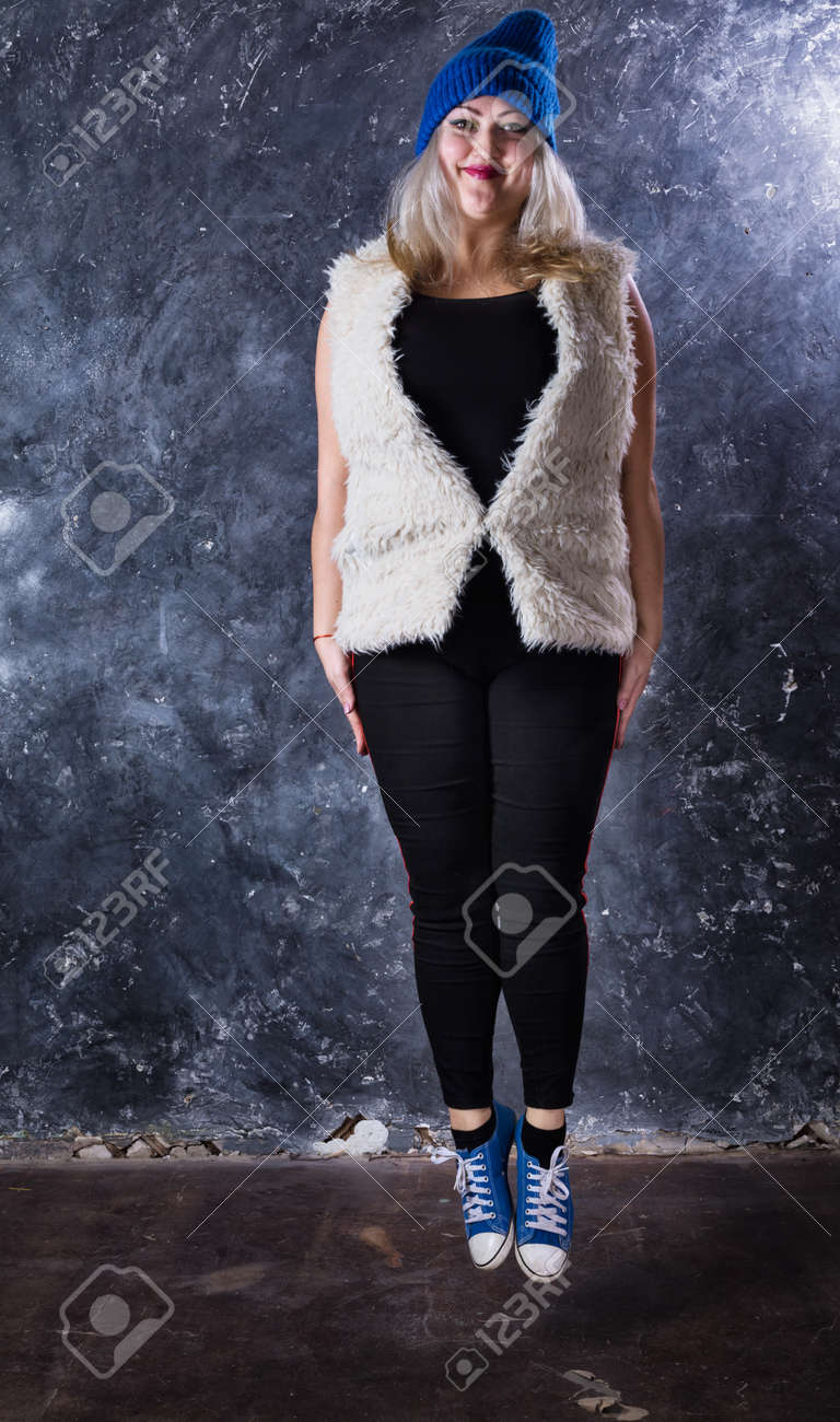Attractive plump woman dressed in sport style casual - 159153174 Attractive plump woman dressed in sport style casual - 159153174