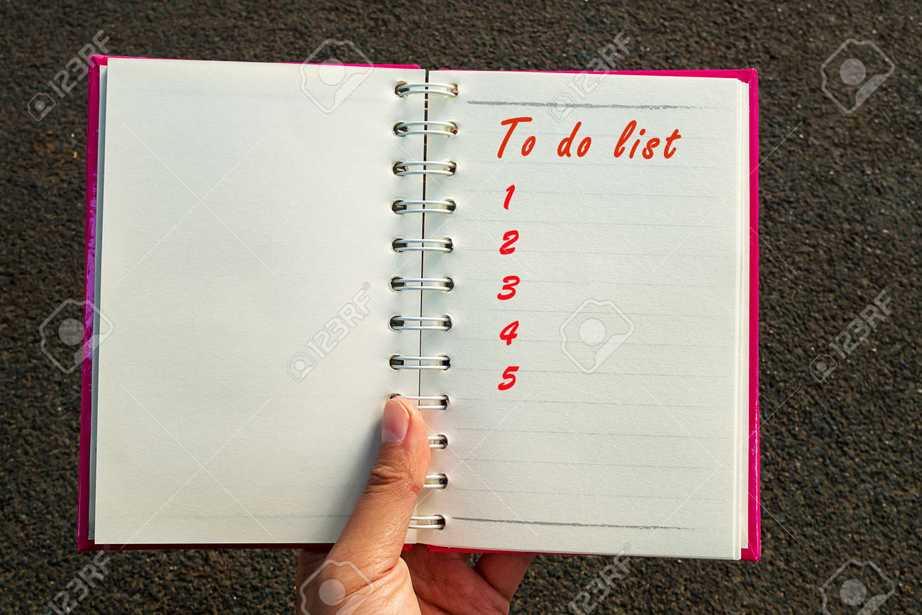 To Do List Write On Blank Open Book With Woman Hand Holding Book - 
