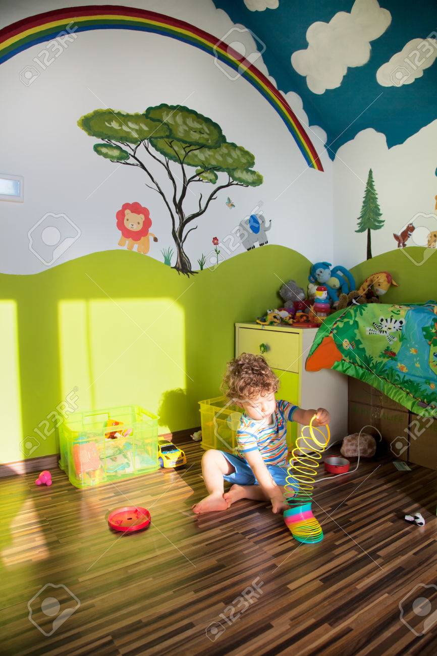 Portrait Of 1 Year Old Baby Boy Playing In His Beautifully Painted.. Stock Photo, Picture And Royalty Free Image. Image 39957790.