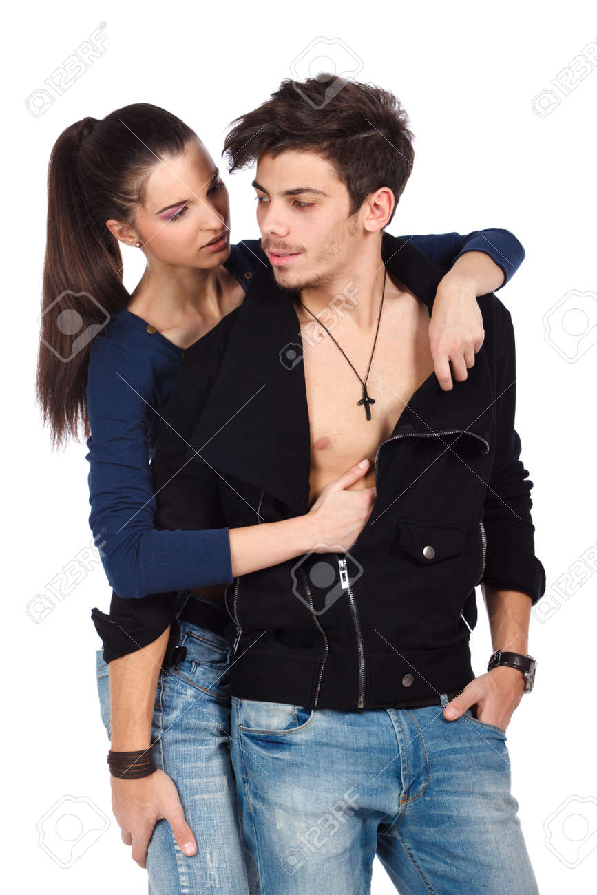 Stock Photo Young Couple Of Two Lovers Flirting Woman Seducing And Touching Man Isolated On White Background High Resolution Studio Image Stock Photo Young Couple Of Two Lovers Flirting Woman Seducing And Touching Man Isolated On White Background High Resolution Studio Image