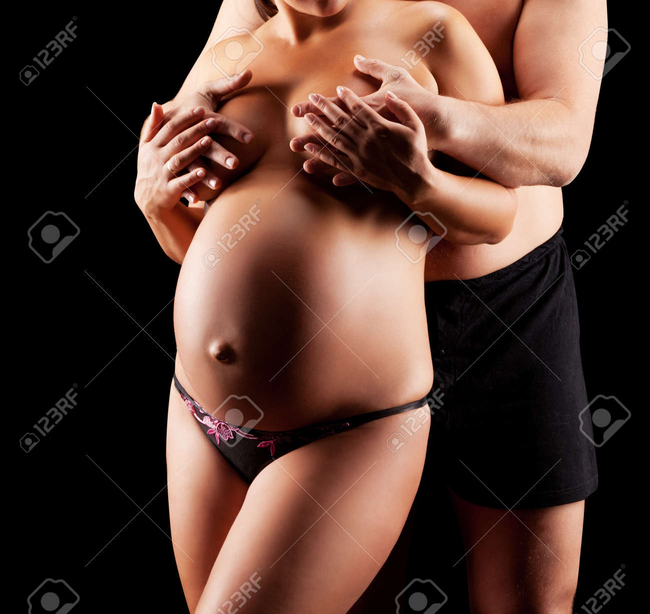 Mulher Grávida Nua Com Seu Marido Foto Royalty Free, Gravuras, Imagens e  Banco de fotografias. Image 10751434